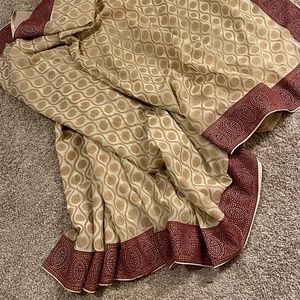 Khari print off-white saree with red border